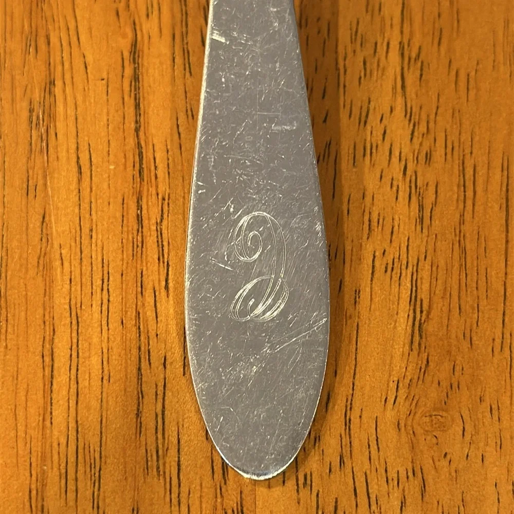 Reed & Barton silver plated serving spoon with “C” monogrammed on the handle.